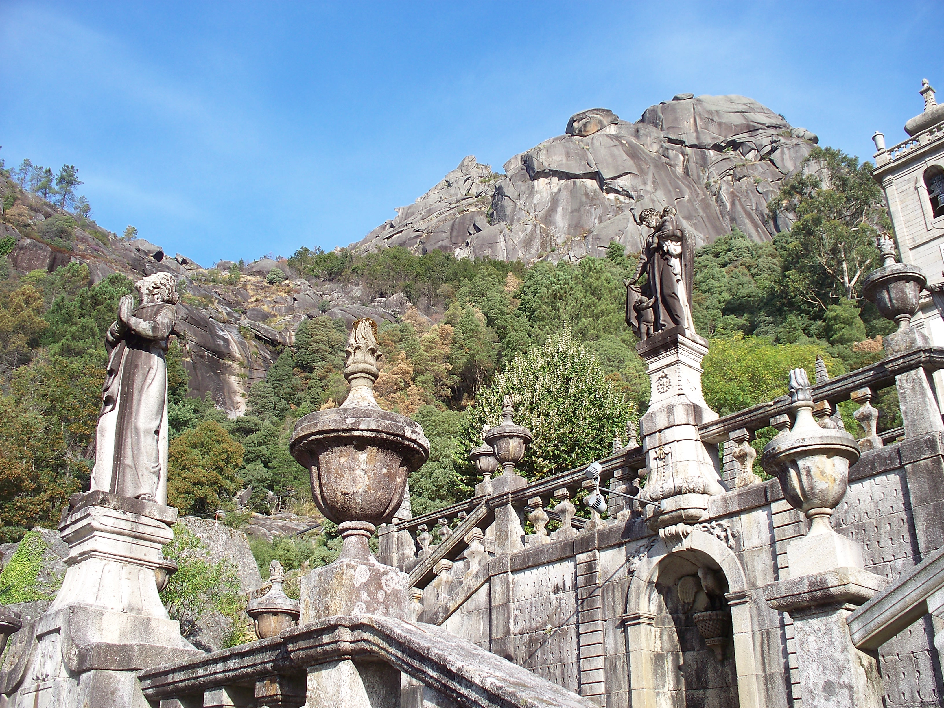 The pilgrimage church of Nossa Senora is set between mountain ridges.